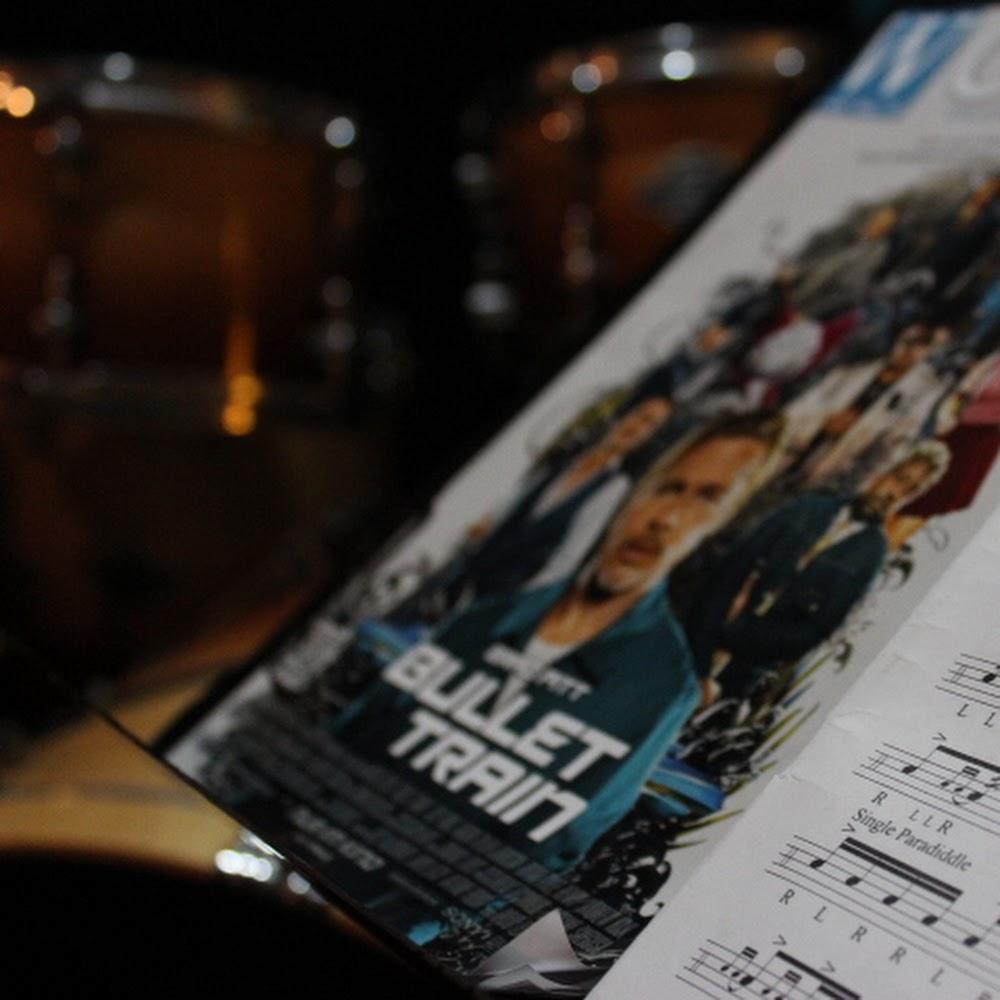 A music stand with sheet music and a